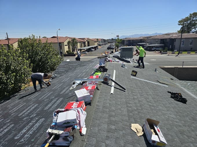 XRP Roofing team working on a tile roof installation in Phoenix AZ
