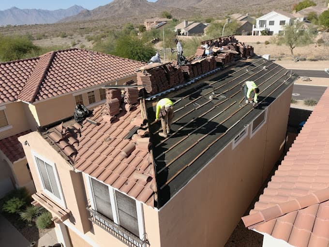 XRP Roofing crew completing a roof replacement in Phoenix Arizona